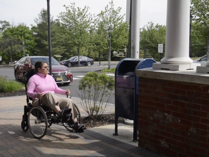 Dropping off the Mail with Velochair